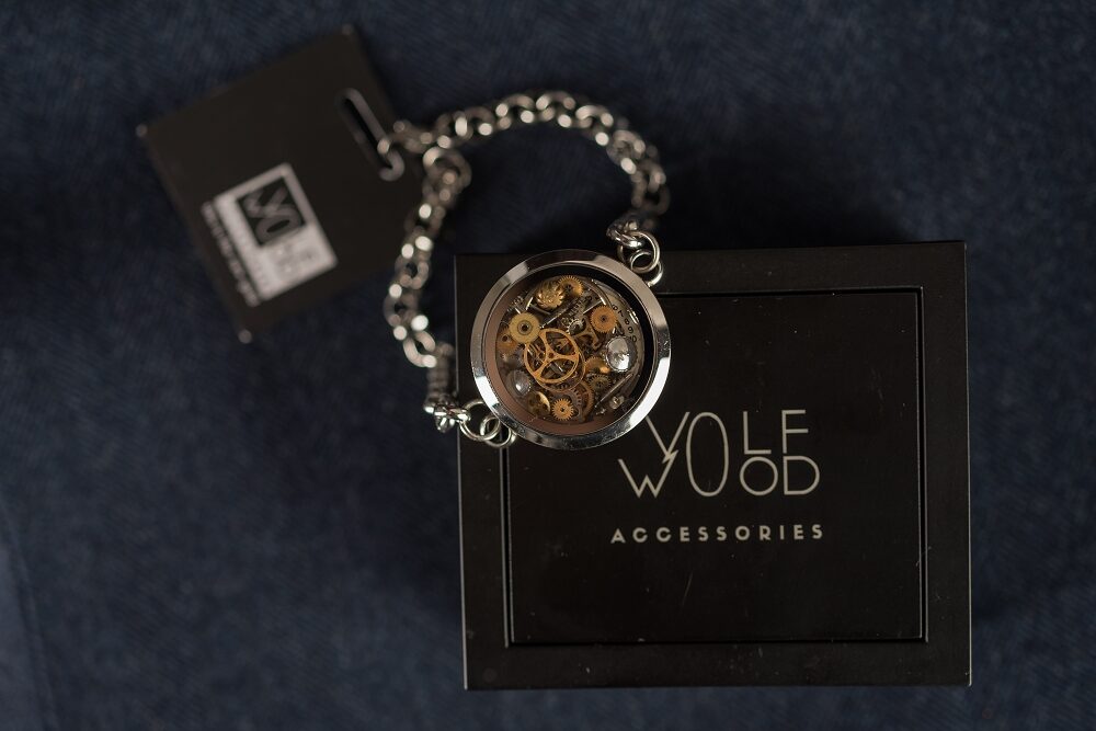 Glass bracelet with watch gears