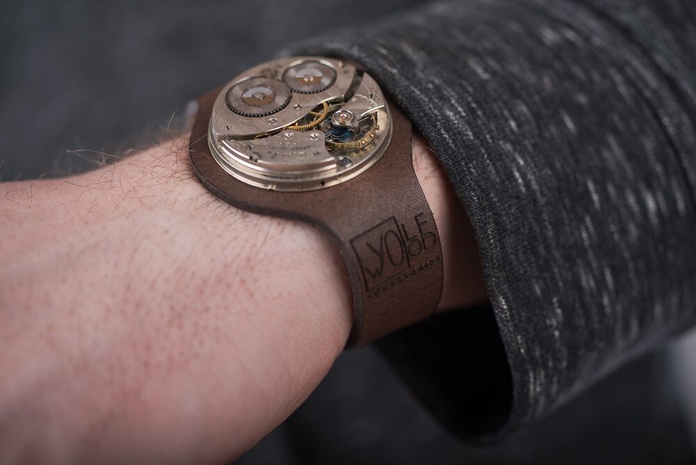 Brown leather bracelet with pocket watch movement