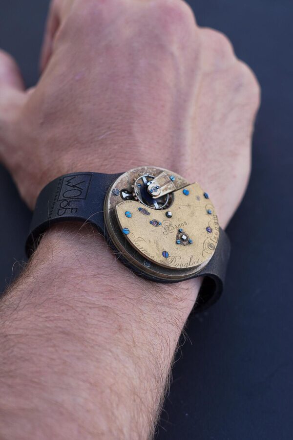 Black leather bracelet with pocket watch movement