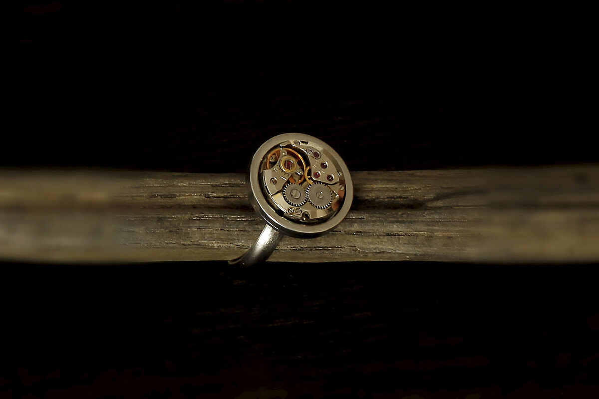 Ring with a small watch movement
