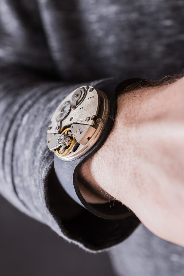 Grey leather bracelet with pocket watch movement