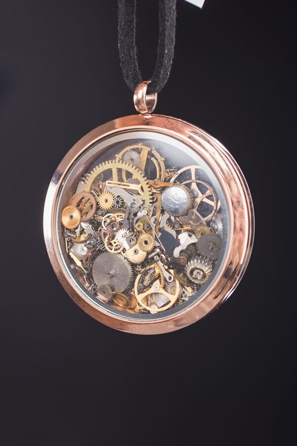 Rose gold necklace with movement gears