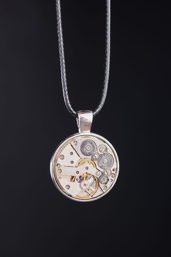 Necklace with watch movement 